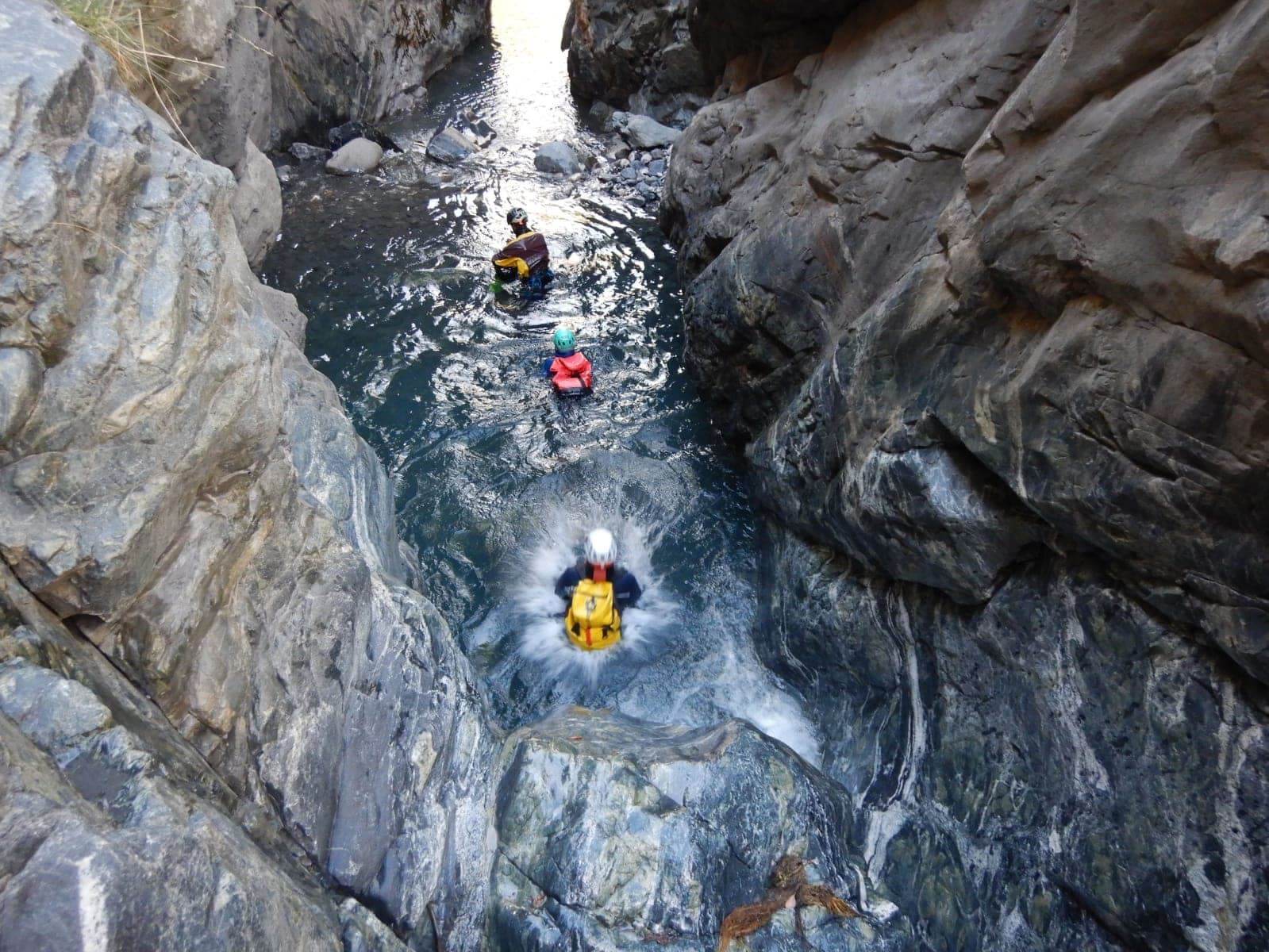 Jump into a natural pool during a canyoning trip