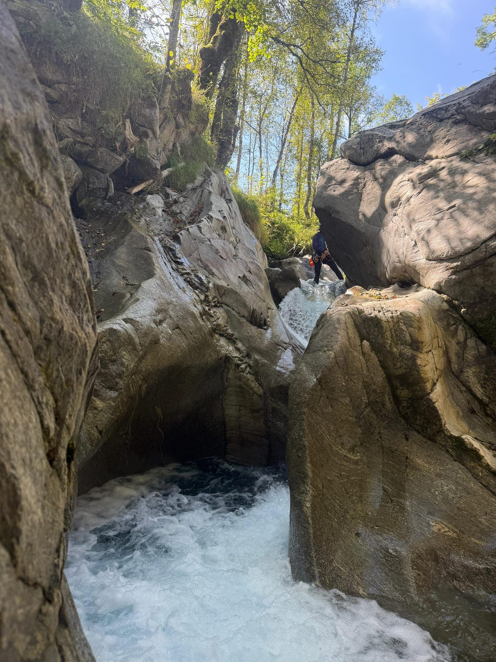 Natural waterslide carved in the rock, Ubaye canyoning